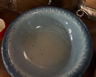 Large stoneware bowl with blue rim