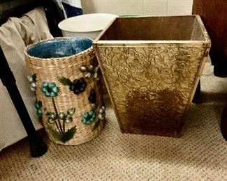 About a half a dozen waste baskets in various forms