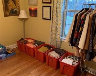A corner of the women’s boutique! Bins of sweaters, turtlenecks, blouses, all sorts of women’s clothing