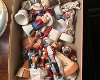 Set of unusual pottery figurines. Cowboys and Indians, could be a chess set? No chessboard.