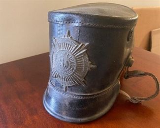 GERMAN LEATHER VISOR HAT WITH
HAT PLATE STAMPED WITH SMALL EAGLE AND "WITH GOD FOR KING AND FATHERLAND” AND DATE 1860.