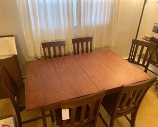 Dining table. Includes 6 chairs and two 24” leaves 