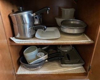 assorted kitchen items pots and pans