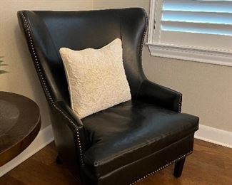 $975~OBO~ AMAZING ARHOUS BLACK LEATHER CHAIR WITH NAIL HEAD EMBELLISHMENTS. AN AMAZING FIND !