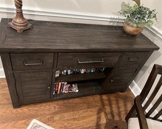 $390~ THREE DRAWER ENTERTAINMENT CENTER
