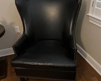 $975~OBO~ AMAZING ARHOUS BLACK LEATHER CHAIR WITH NAIL HEAD EMBELLISHMENTS. AN AMAZING FIND !