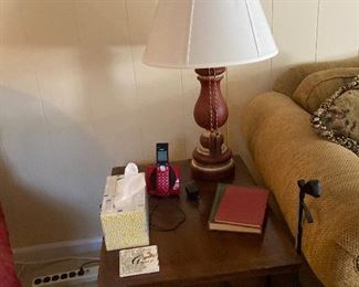 Nice end table with one of a pair of lamps