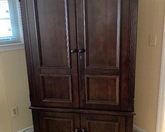 Good looking entertainment center.  Add shelves and you have a good looking armoire.