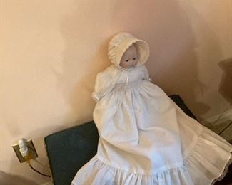 Doll with hand smocked dress and bonnet