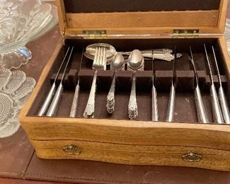 Eight place settings four pieces each with storage box one of two sets