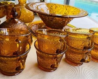 44_____$140
Amber cut glass dinnerware set