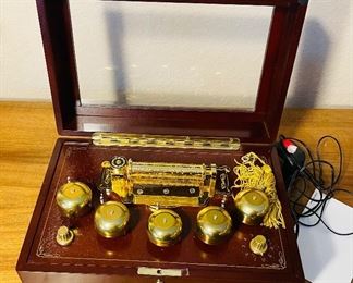 50________$50
Electric multi song music box