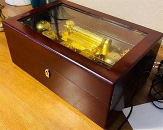 50________$50
Electric multi song music box