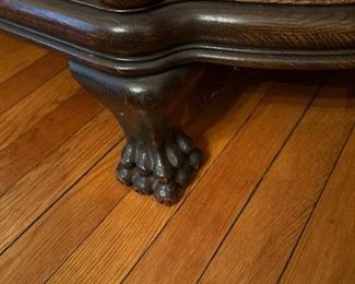 Antique tiger oak bowed China cabinet early 1900s with Chinese dragon embellishment and claw feet