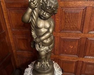 Stone cherub statue, painted bronze. Some chips.