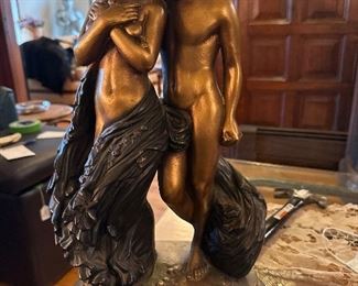Vintage gold painted stone figures. Titled “Lovers” 