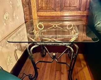 Metal and glass and table. Comes with matching coffee table.