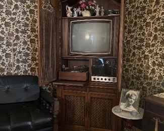 Magnavox TV, turntable radio receiver, an eight track tape