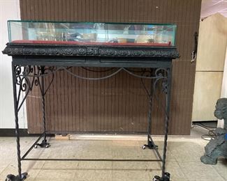 freestanding retail or home display case with hidden storage, cast iron base, plexi top