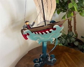 Iron rocking sail boat weighted metal sculpture
