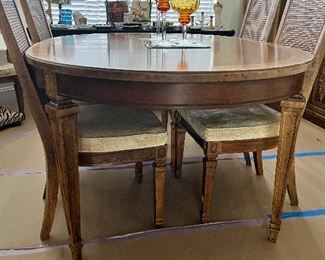 Dining room table. Six chairs and one leaf