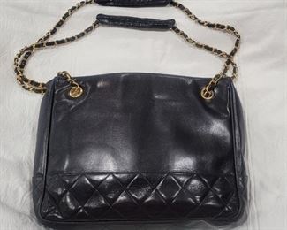 Purse 1 Chanel made in Italy.  Gently used and in very good condition.   All stiching looks good.  Inside nice and clean. 12 X 9 