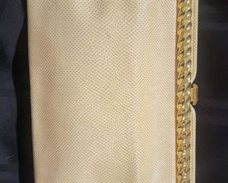 Purse 6 Judith Leiber snakeskin purse.  
Gently used in very good condition.  Clean inside and out.  Comes with detachable strap.   10 X 8