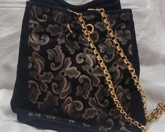 Purse 7 Salvadore Ferragamo purse.  
Gently used condition clean inside and out. Crossbody strap.   Made in Italy.
8 X 9 