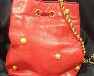 Purse 14 Salvadore Ferragamo red cross body bag drawstring handbag.  Very nice clean inside light soil to edges.   See pictures.   9 X 9