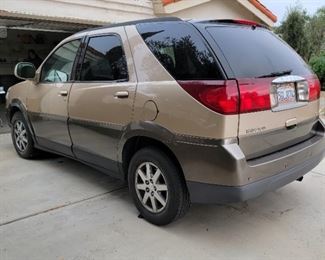 Buick Rendezvous.  2004.  Mileage is appx. 200,000.  Original owner.  Always garaged.  Note:  exact mileage and engine type to be confirmed.