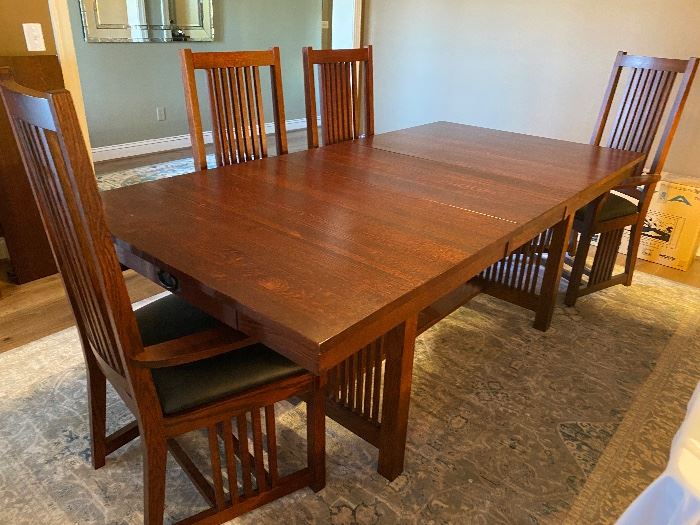 Villigeois Industries Mission Style dining table with 2 leaves and 8 leather chairs. drawers on both ends. 42”w x 66”-101”l