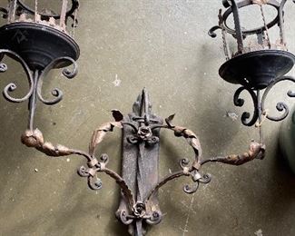One of the pair of sconces