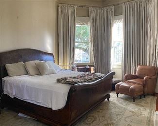 Leather upholstered King sleigh bed, good  looking leather chair and ottoman, large  Oushak rug