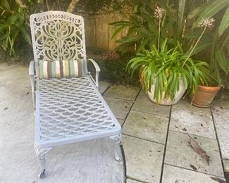 Pair of iron chaise lounges 
