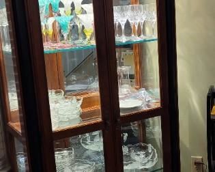 Ethan Allen lighted curio cabinet with glass shelves