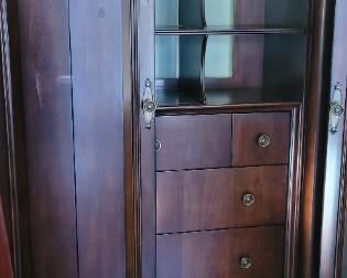 interior of Mahagony bifold door cabinet