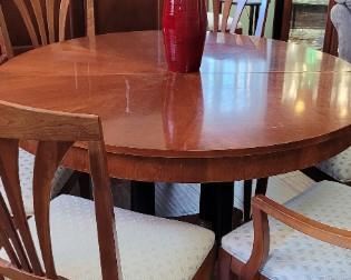 Ethan Allen dining table, has two leaves, Ethan Allen upholstered chairs