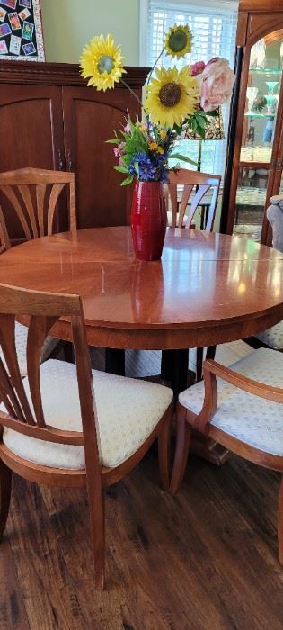Ethan Allen dining table, has two leaves, Ethan Allen upholstered chairs