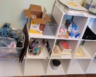 white cube storage units and tons of office supplies