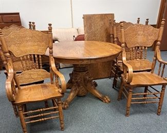 7 pcs. oak table w/ lions head and claw pedestal and leaf
