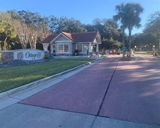 D0 NOT TRY TO COME IN THROUGH THIS ENTRANCE, OFF WOODGREEN DR., THE GUARD WILL NOT LET YOU IN.  GO SOUTH OF THIS ENTRANCE A COUPLE TENTHS OF A MILE AND YOU’LL SEE ANOTHER ENTRANCE W/ AN ARMBAR & KEYPAD, ENTER THERE.  