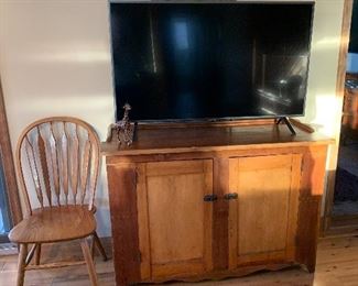 Antique cabinet in good condition. Television is for sale.
