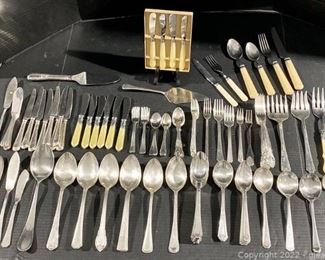 Huge Assortment of Silverware in Multiple Patterns