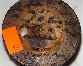 BOTTOM OF WOODEN SANDER WITH WRITING 