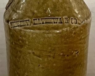 19th CENTURY STONEWARE BOTTLE WITH IMPRESSED MARK “VINCENT HATHEWA & CO.” 