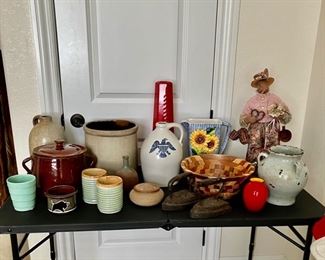 Table of primitive, farmhouse items.