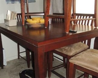 Like new bar height table with 6 chairs