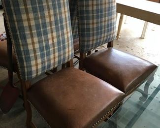 Set of 4 plaid and leather chairs with decorative nailheads.