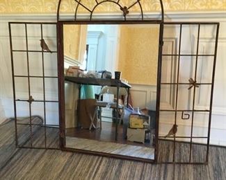 Architectural garden or decorative screen with arch and bird motif. Solid. The doors do close. $250