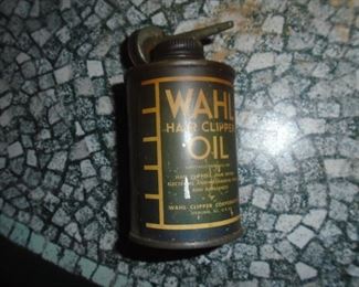 small advertising can (Wahl hair clipper oil)